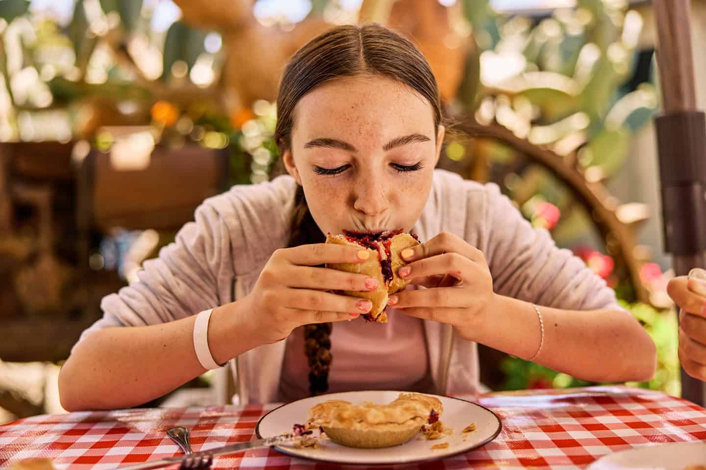 Girl eating Linn's olallieberry pie